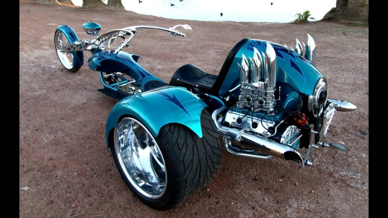 Мотоцикл с двумя передними колесами фото