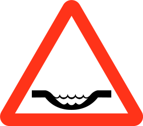 Traffic sign of Bangladesh: Warning for a dip in the road